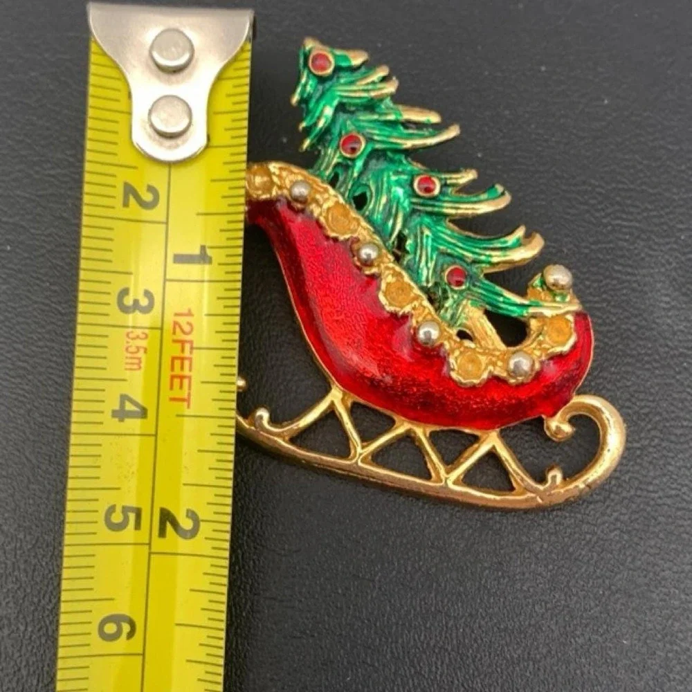 Vintage Christmas tree in a sleigh brooch